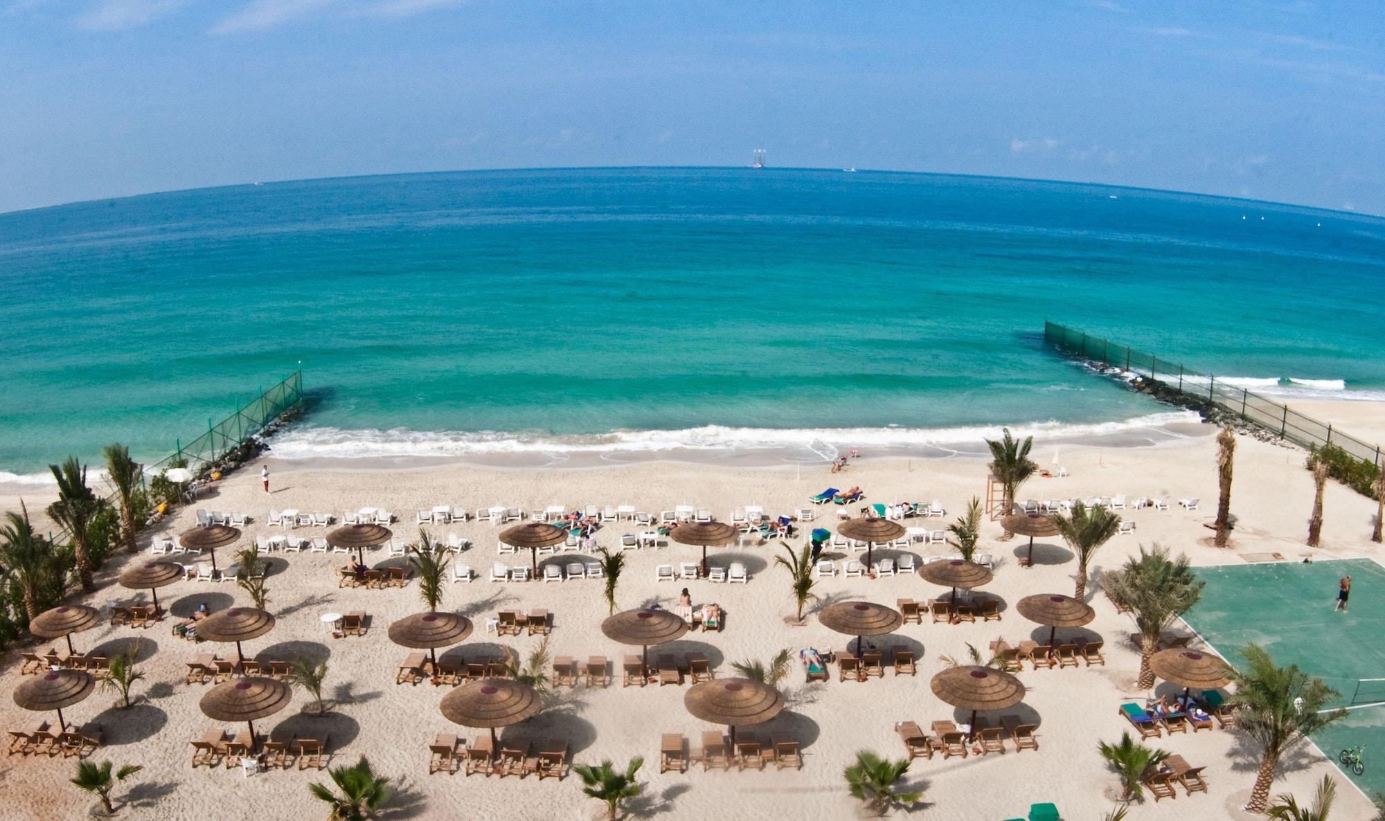 Sahara Beach Resort & Spa Şarja Dış mekan fotoğraf Beach at Jumeirah Beach Hotel